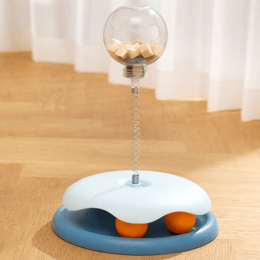 Interactive cat treat puzzle toy with rolling balls and treat container for mental stimulation