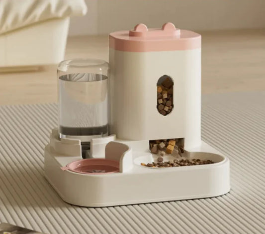 Automatic Pet Feeder & Water Dispenser โ Food and Drinking Station in pink with gravity-fed design for cats and dogs. Dual compartments for food and water.